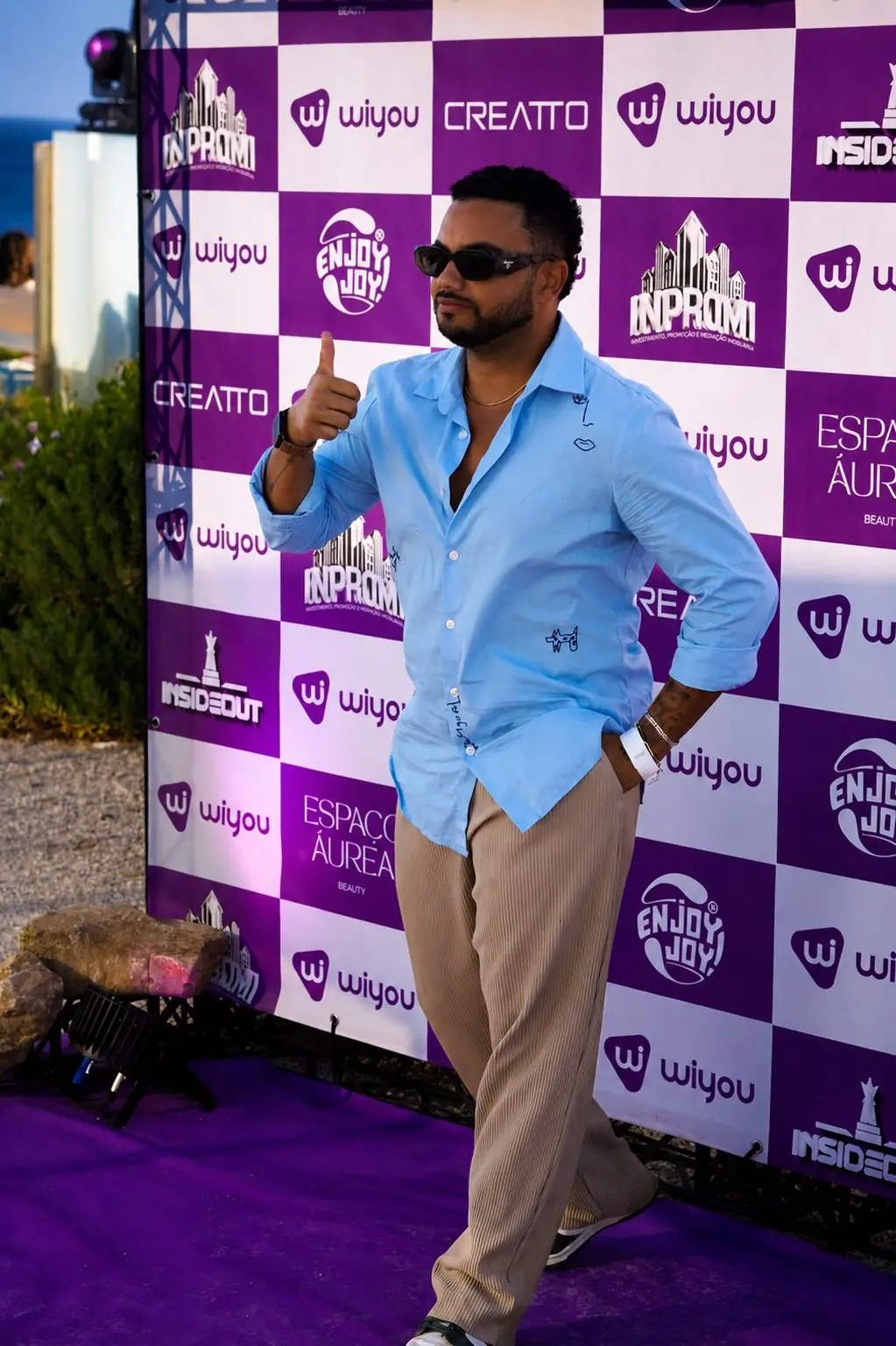 Convidado no photocall do evento WIYOU